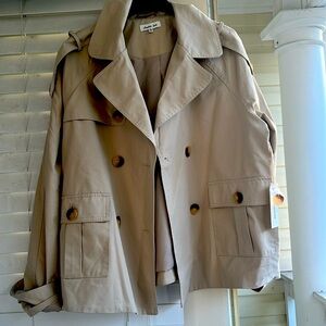 Another Love jacket NEVER WORN runs Large, nicely lined.